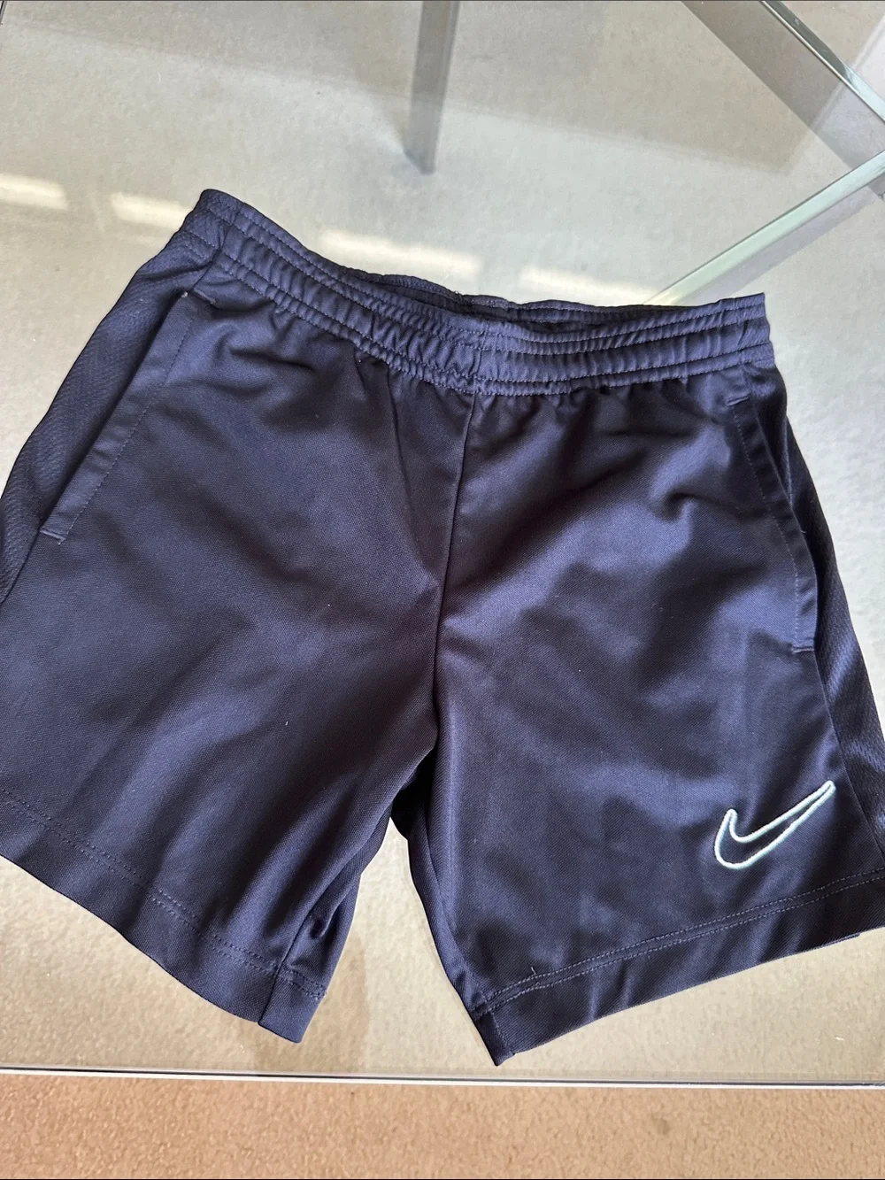 NikeUnisex kids Black Athletic Shorts with White Swoosh